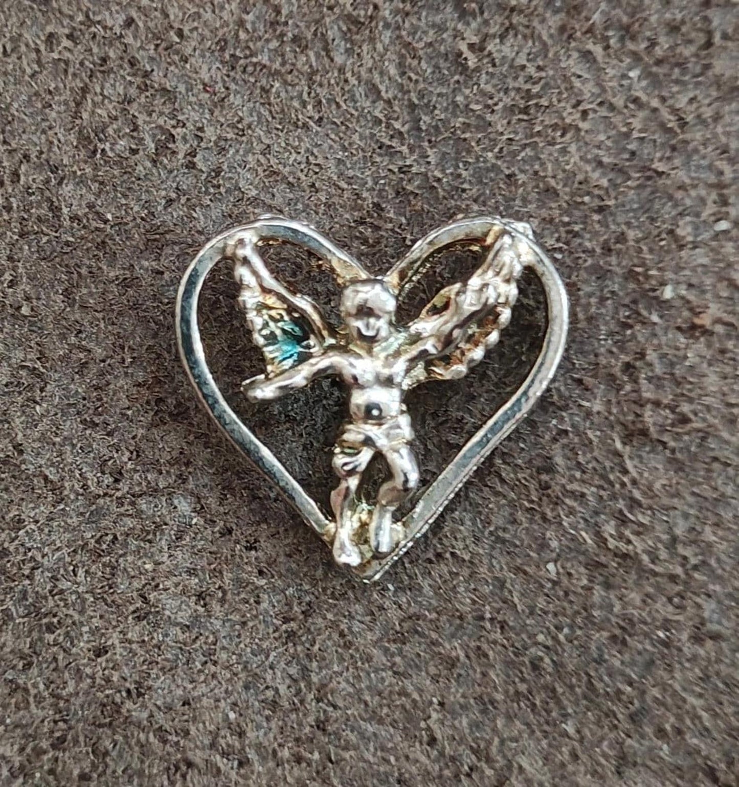 1980's Silver Tone Angel Inside A Heart Pin