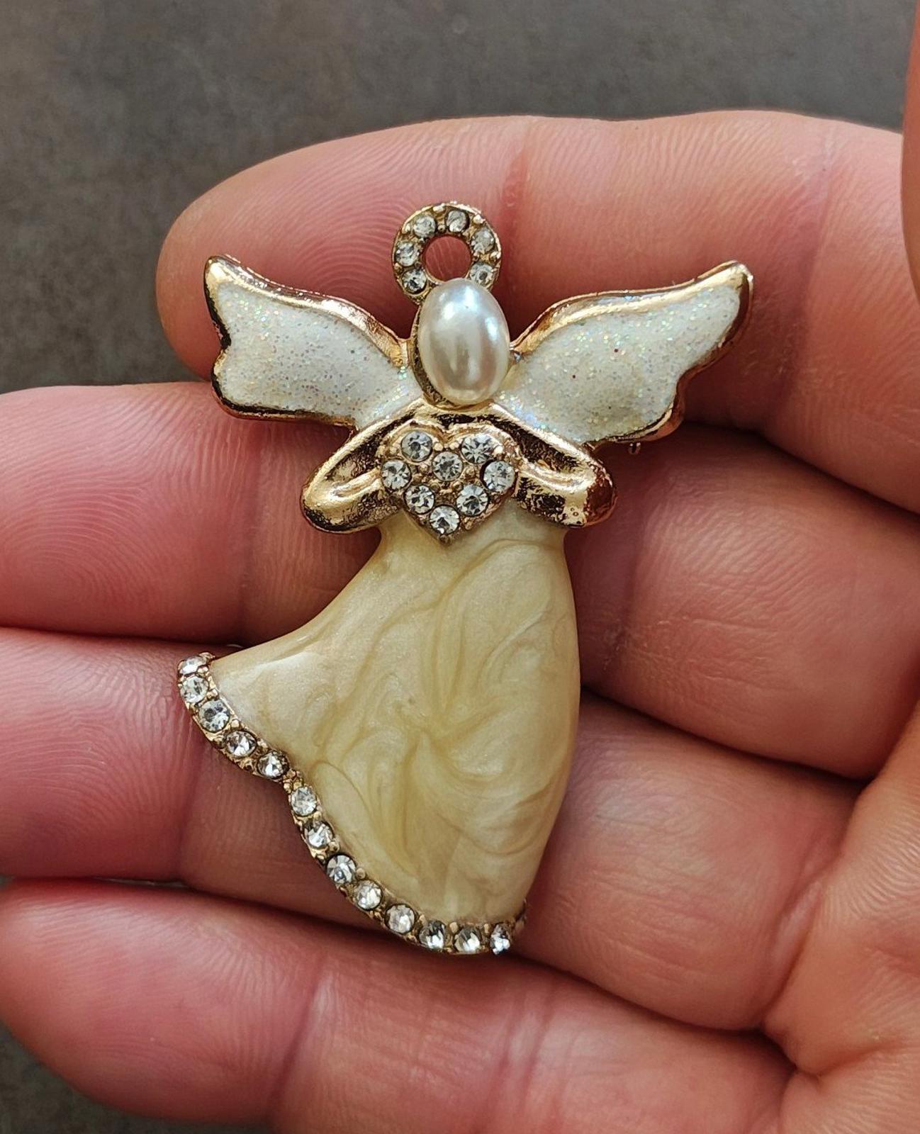 1980s Signed KC (Kenneth Cole) Pearlized Enamel Angel Gold Tone Brooch