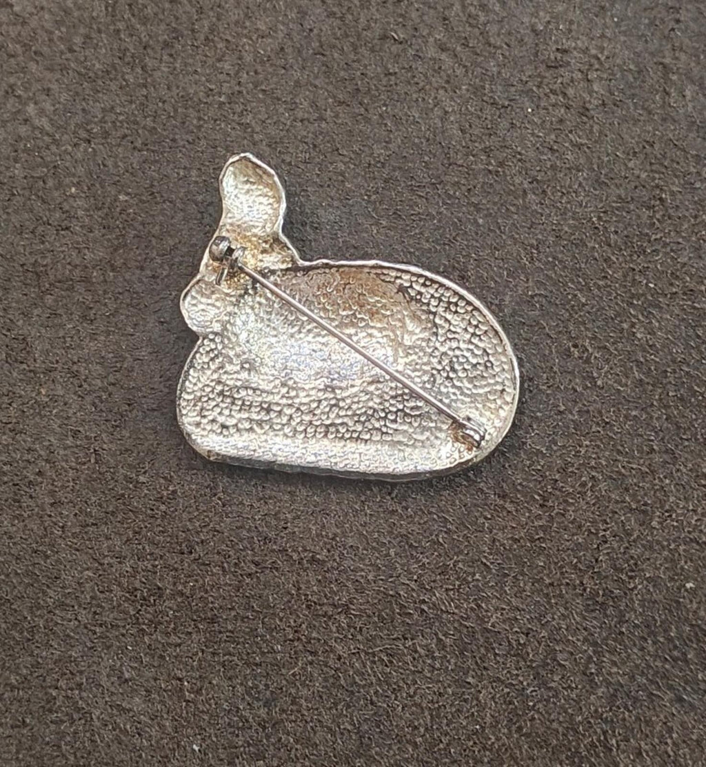Silver-tone brooch back with pin and clasp, textured metal heart shape