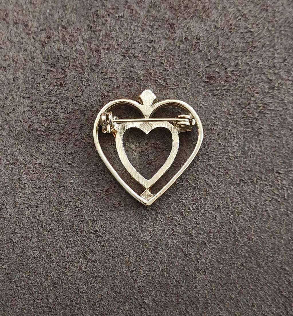 Gold-tone heart brooch pin back view with clasp and hinge hardware