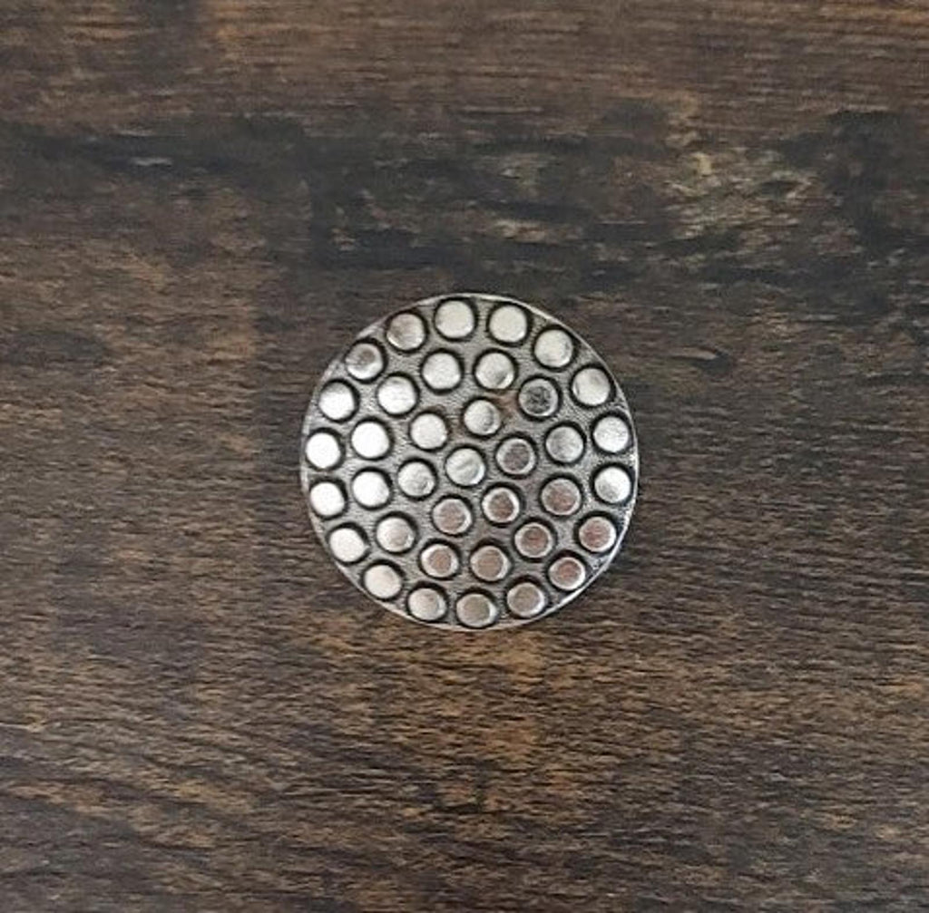 Round scarf clip front with engraved dot pattern in silver and darkened spots