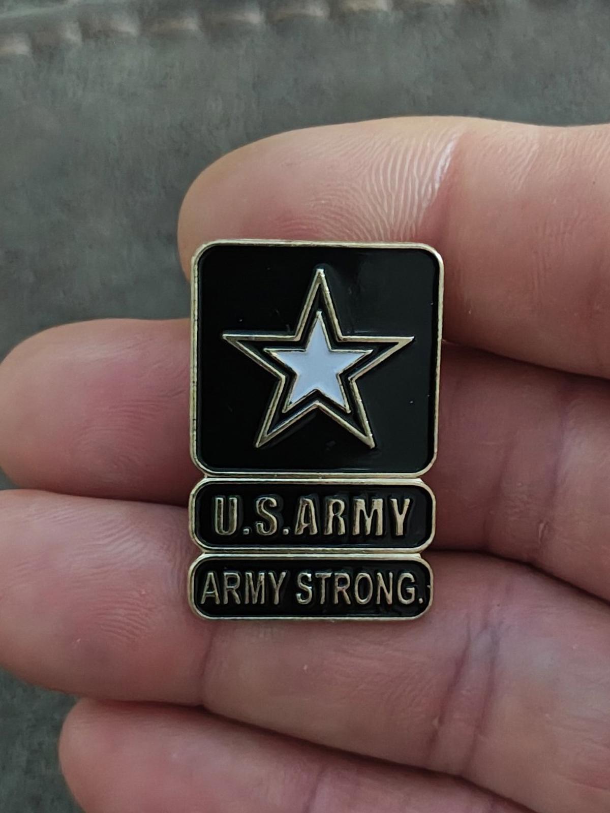 Black U.S. Army enamel star lapel pin with U.S. ARMY and ARMY STRONG text