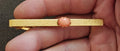 1950s/60s Gold Tone Tie Bar Clip With Oval Salmon Pink Coral Cabochon Stone