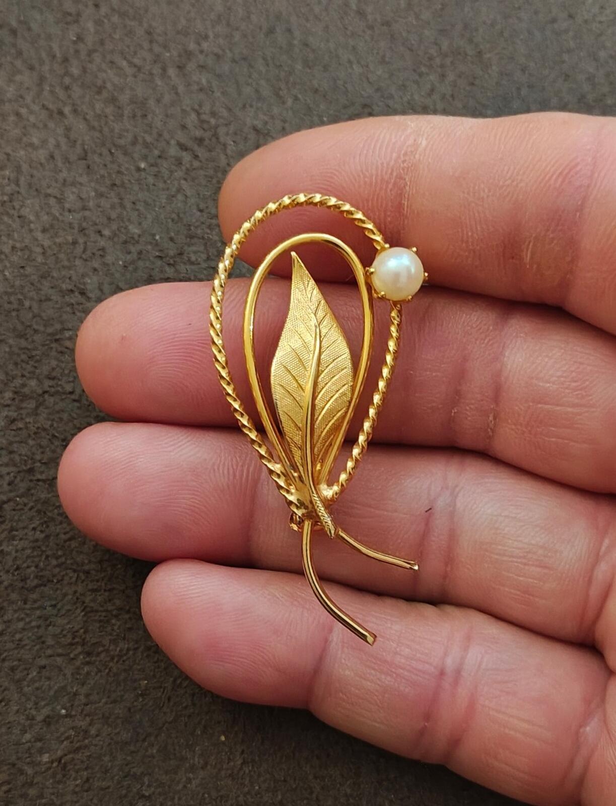 1960s Gold Tone Swirl Leaf Brooch With a Delicate Faux Pearl Accent