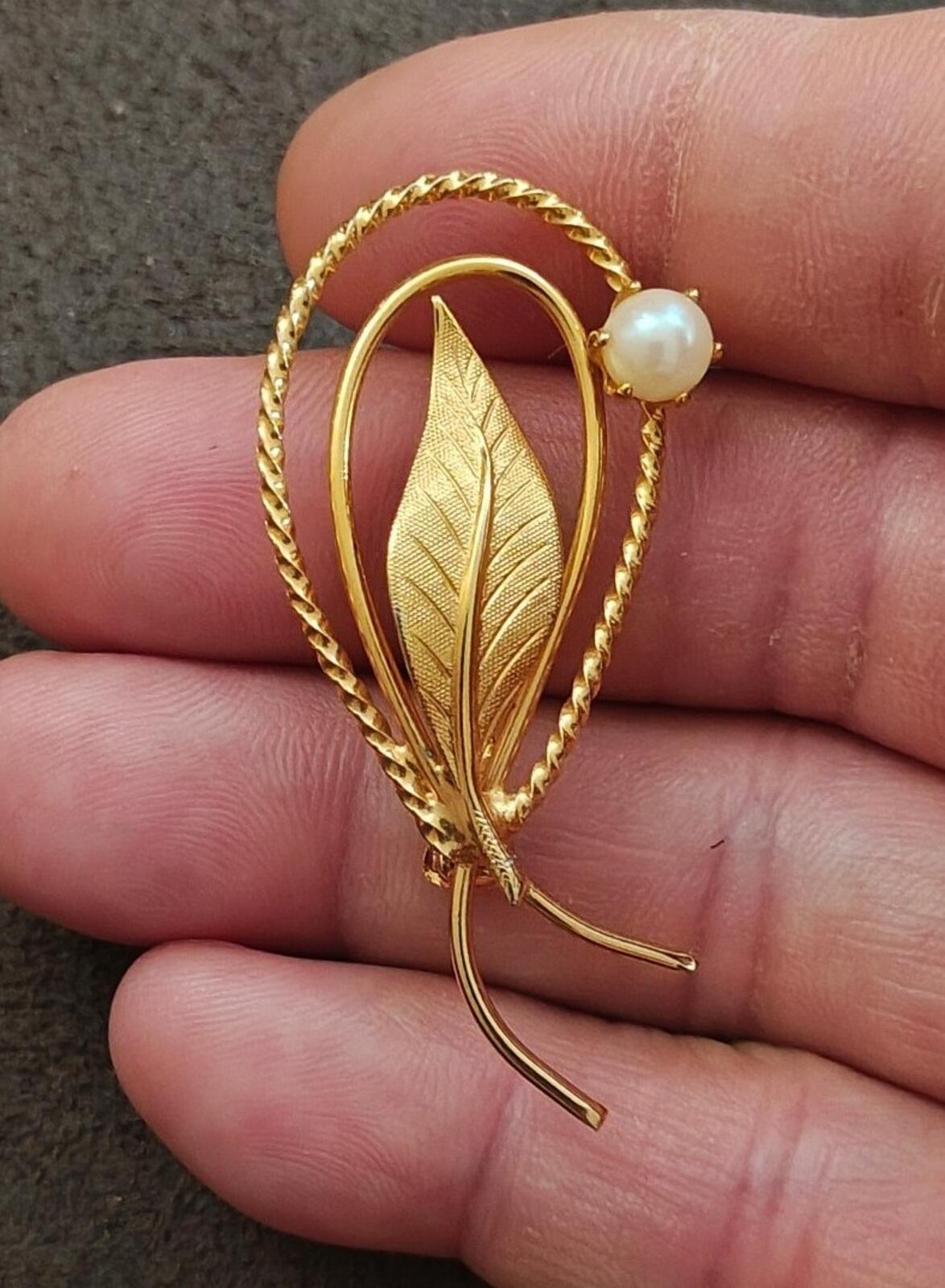 1960s Gold Tone Swirl Leaf Brooch With a Delicate Faux Pearl Accent