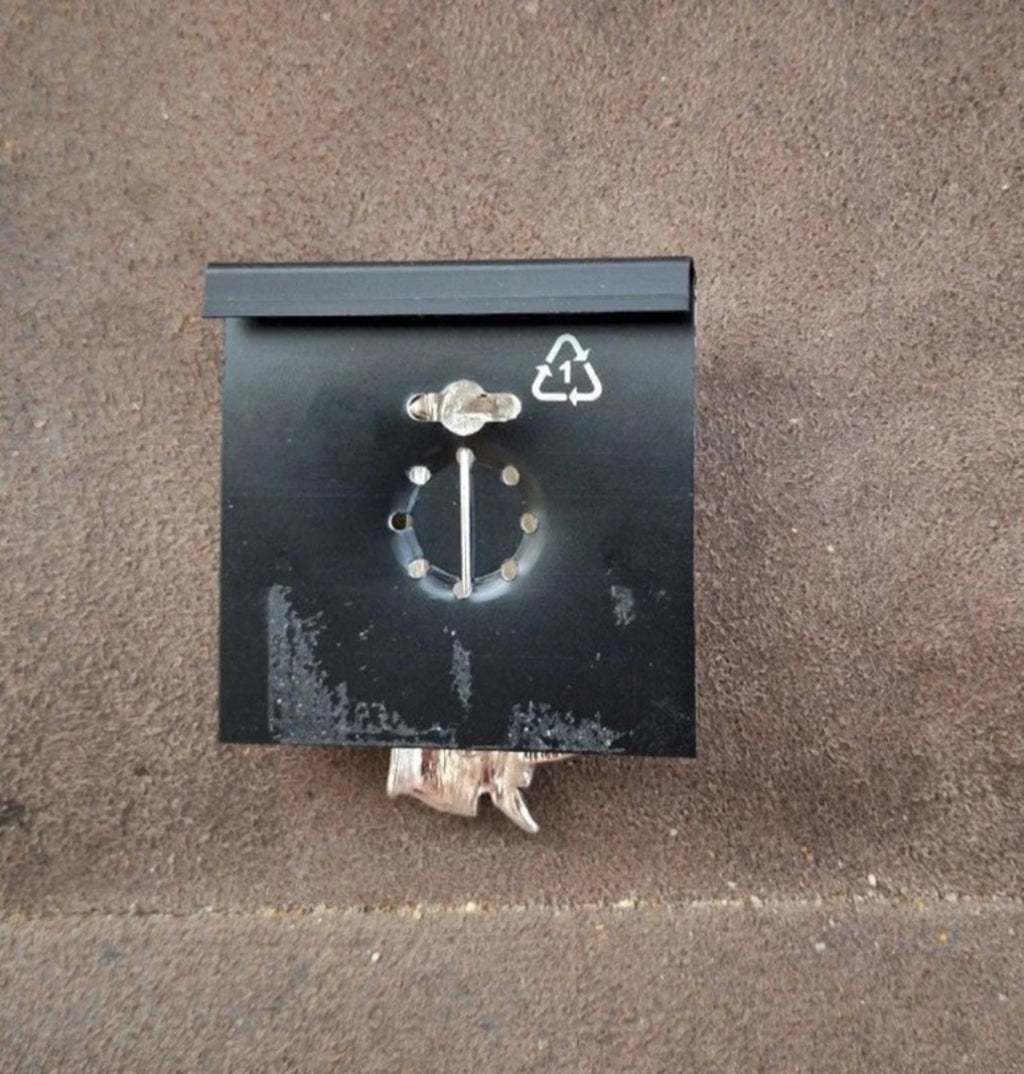 Back of vampire enamel pin with recycling symbol and clasp attachment