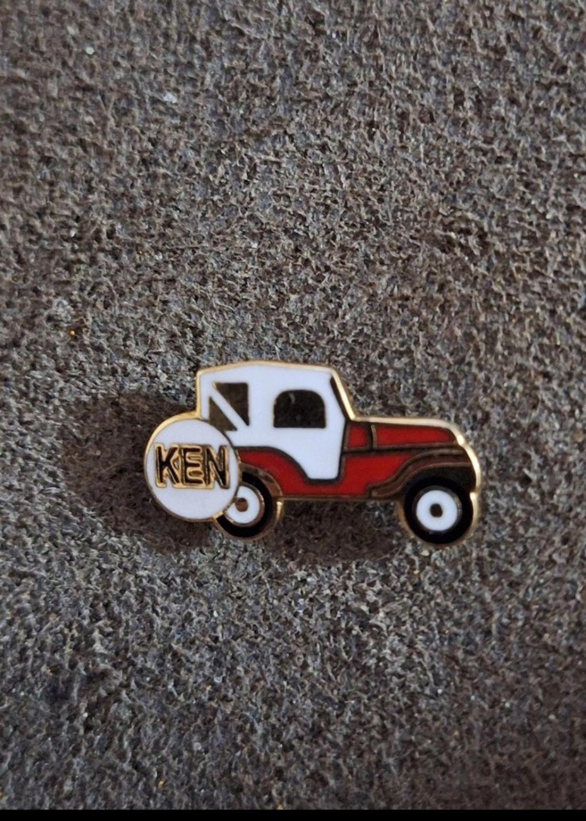 1970s Gold Tone White & Red Jeep With Ken Name On Tire Enamel Pin