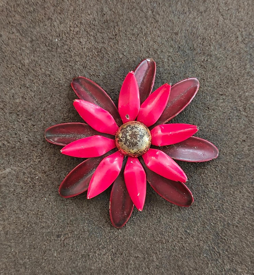 Centered daisy enamel metal pin brooch with red petals and dark burgundy outer petals
