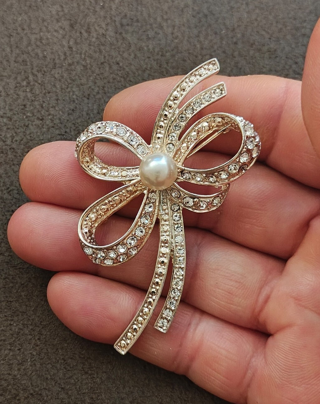1980s Silver Tone Ribbon Bow With Clear Rhinestones & Large Faux Pearl Brooch