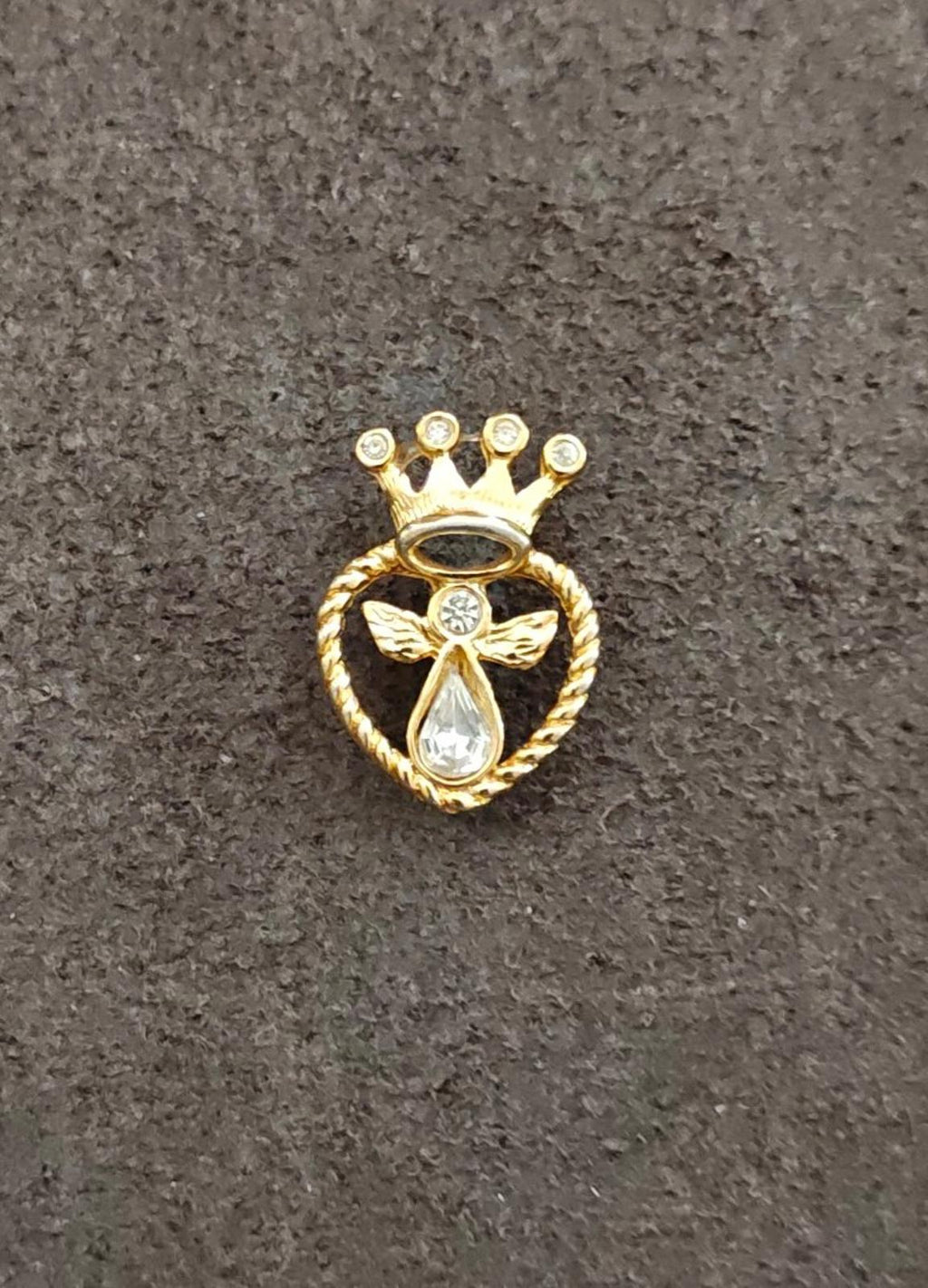 Gold-tone crown heart pin with angel emblem and small round rhinestones
