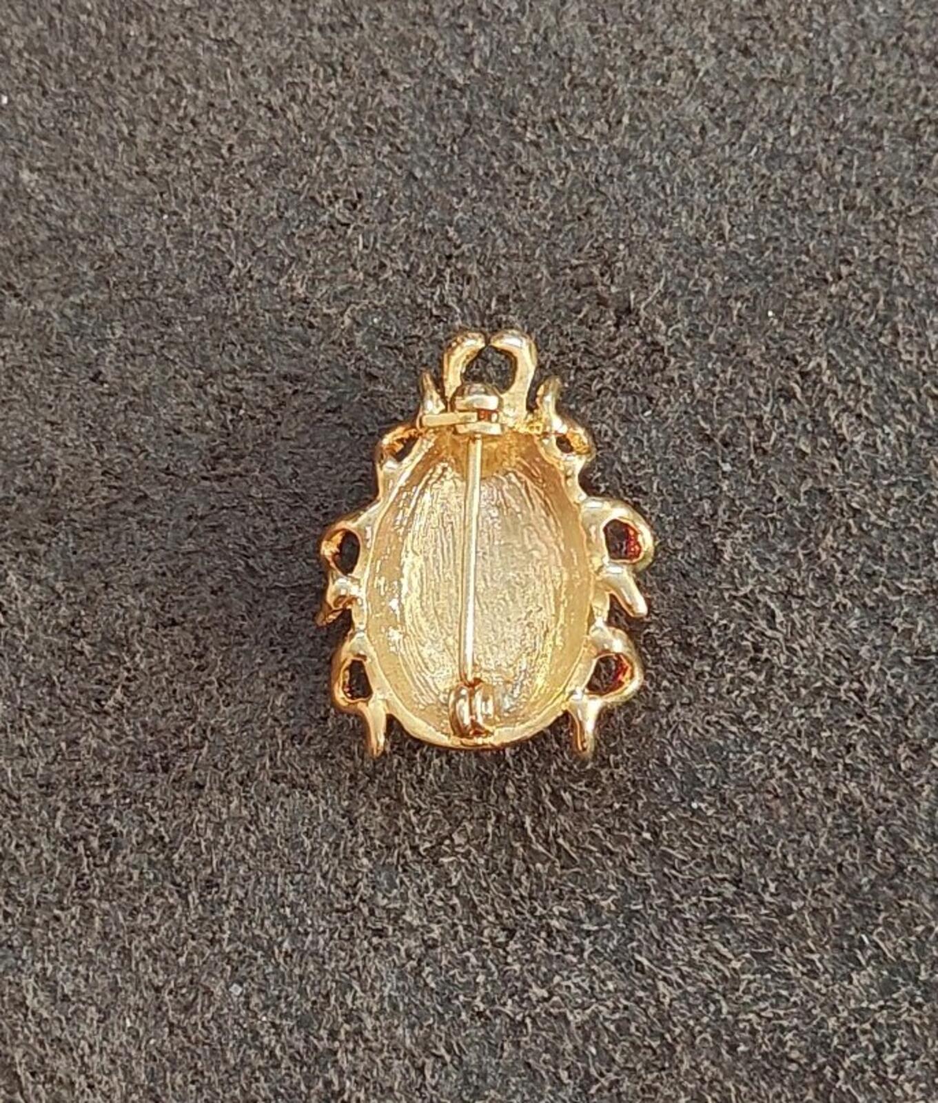 1980s Gold Tone With Red Enamel Ladybug Brooch, a highly collectible