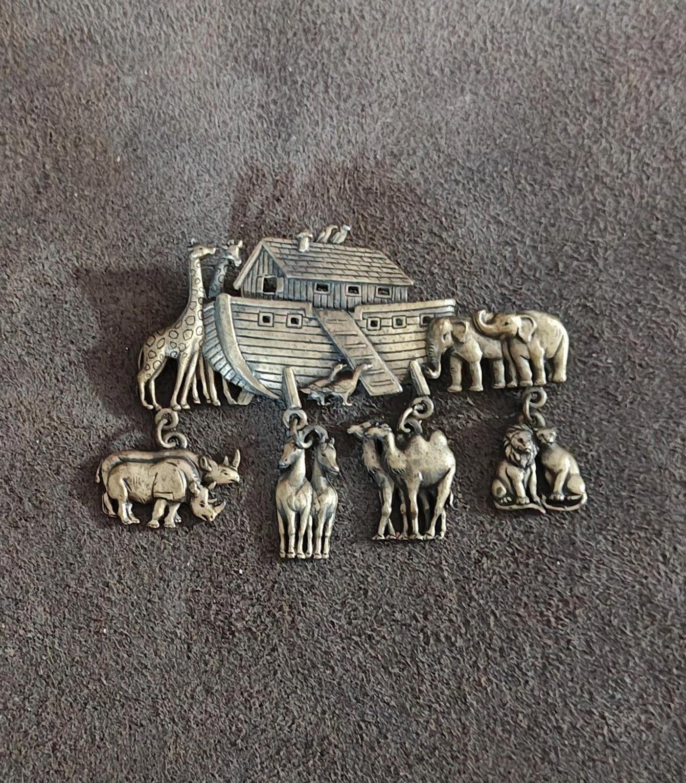 Gold Noah’s Ark brooch pin with ark and multiple dangling animals on short chains