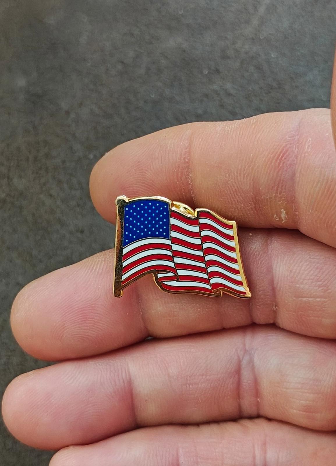 1980s Patriotic Gold Tone Enameled American Wavy Flag Pin.