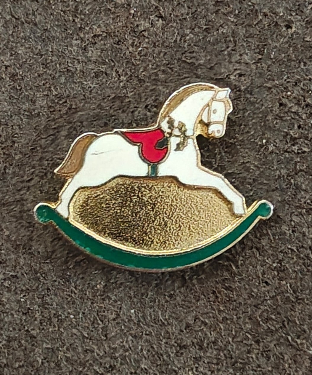 1989 Hallmark Rocking Horse Gold Tone With White, Red & Green Enamel Pin