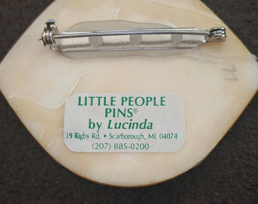 Pin back close-up with safety clasp and "LITTLE PEOPLE PINS by Lucinda" wording