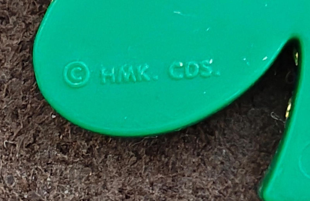 © Hallmark C.O.S. mark on green back of shamrock brooch pin