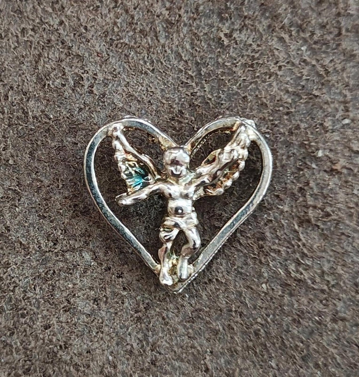 1980's Silver Tone Angel Inside A Heart Pin