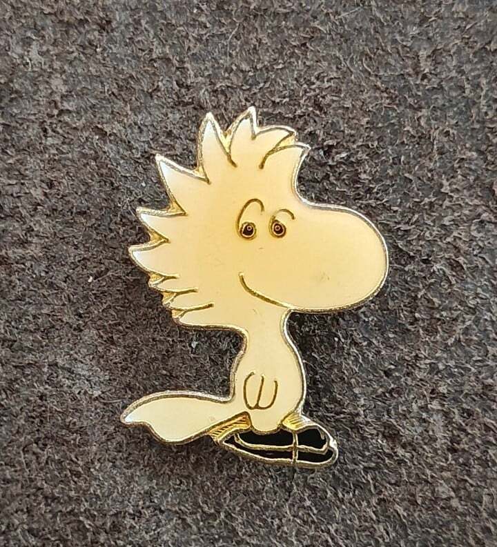 1970s Peanuts Woodstock Wearing Ice Skates Gold Tone Enamel Pin