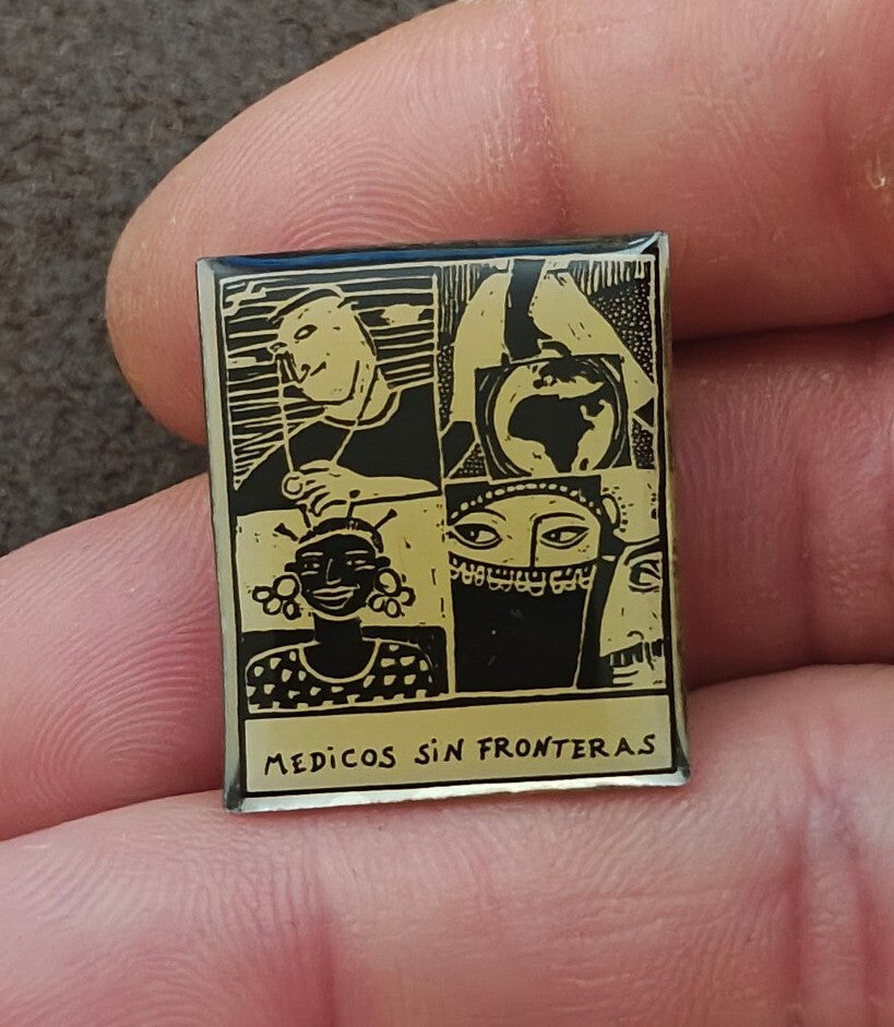 1990s Médicos Sin Fronteras (Doctors Without Borders) Silver Tone Enamel Pin