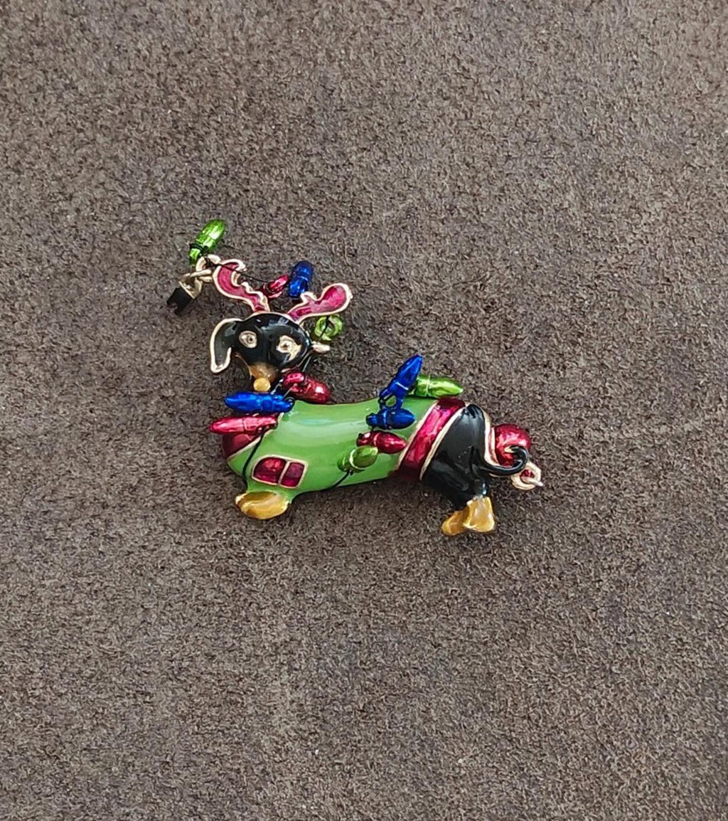 Dachshund dog enamel brooch, side pose with rainbow antlers and blue-and-red light details
