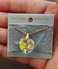 Yellow iridescent heart crystal pendant necklace with gold-tone chain