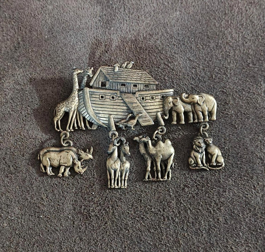 Gold Noah’s Ark dangle brooch pin with arched ark and six animal charms