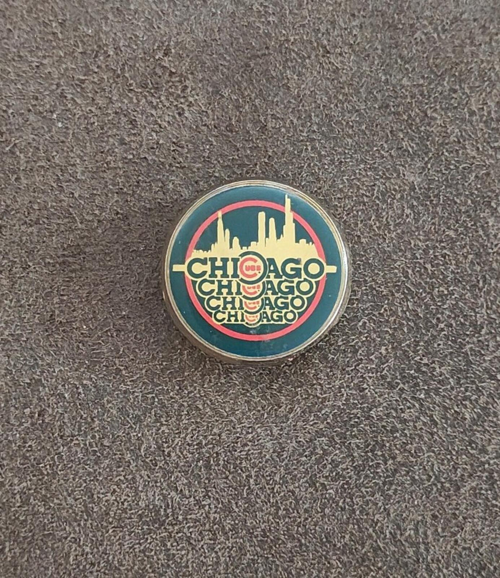 Chicago Cubs MLB round pin with teal “Chicago” skyline, red ring, gold rim
