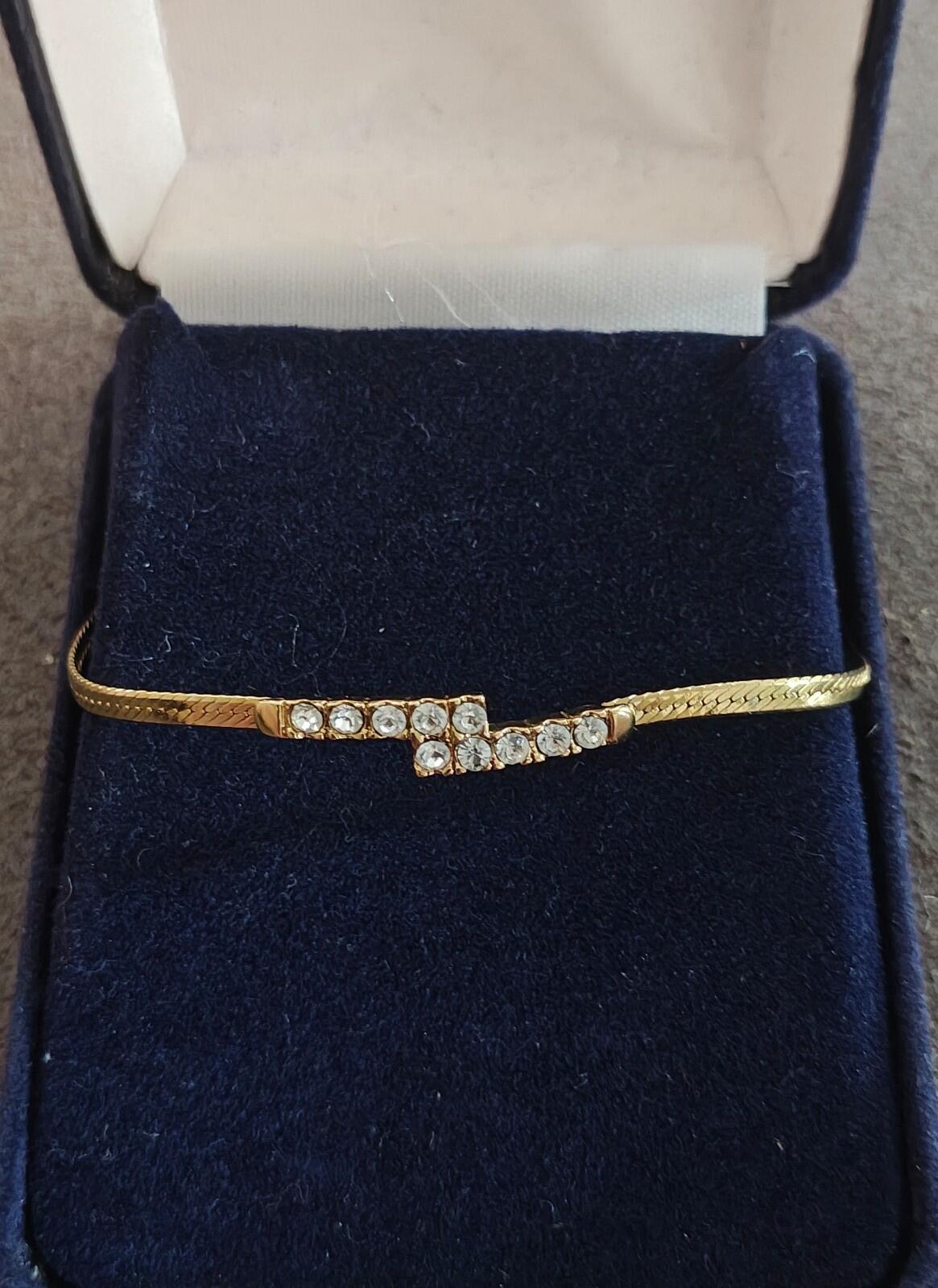 1970 Gold Tone Crossover Bypass Bar Bracelet With Crystal Rhinestone Accents