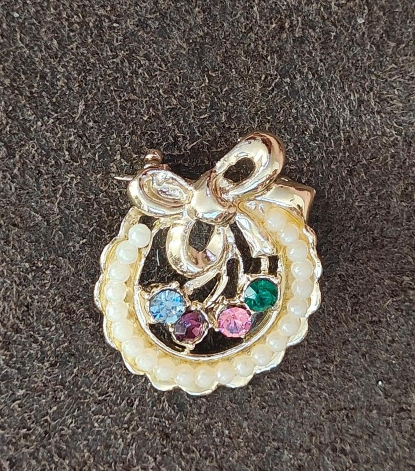 1950s Gold Tone Wreath Brooch With a Delicate Halo Of Cream Colored Faux Pearls