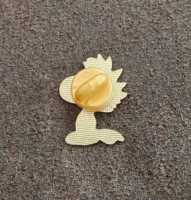 1970s Peanuts Woodstock Wearing Ice Skates Gold Tone Enamel Pin