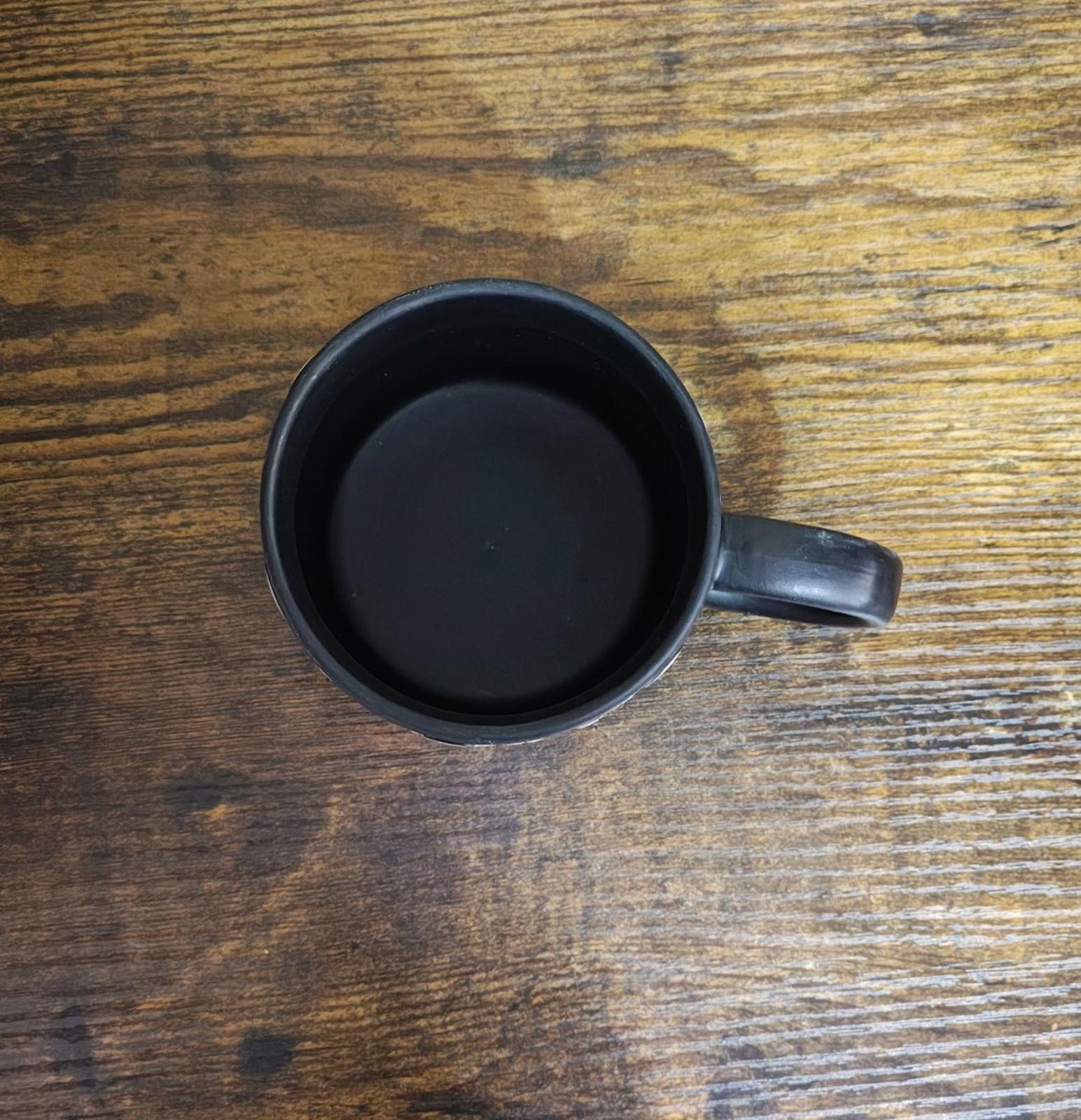 Dancing Skeletons Black Earthenware 13 oz 3D Embossed Black Mug.