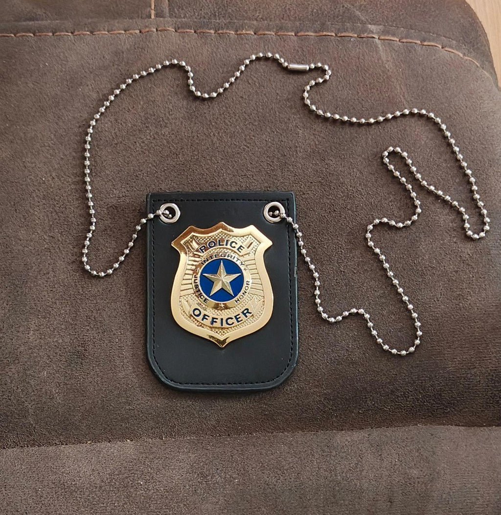 Black badge holder toy with gold police officer emblem and silver ball-chain necklace
