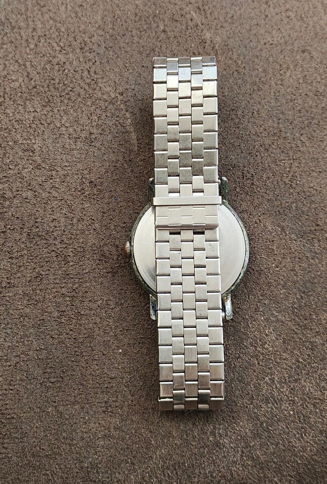 Timex Mercury watch from side/back view with silver mesh metal bracelet