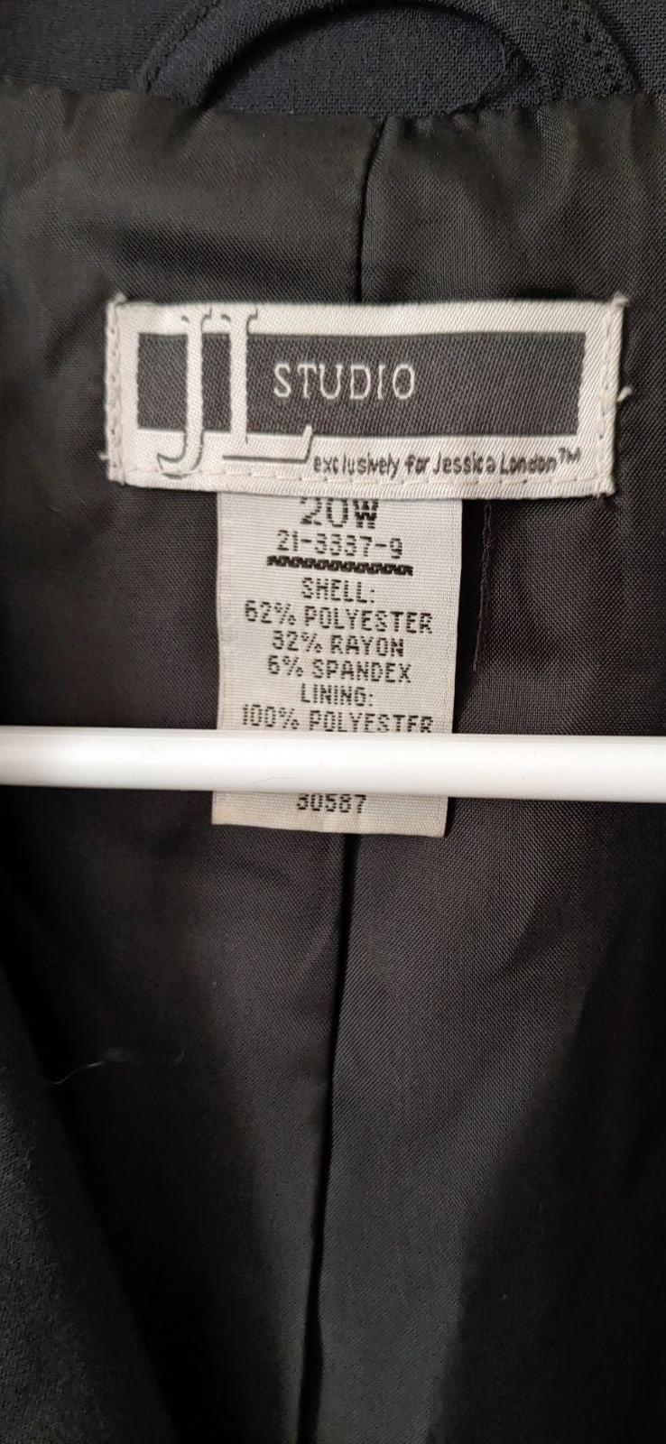 Black blazer size label: Studio, 62% polyester, 38% rayon, lining 100% polyester.