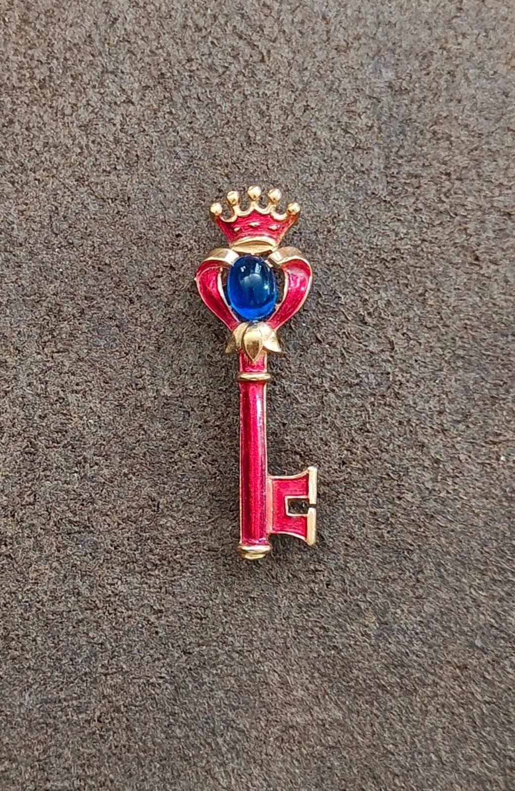 1940s/50s Crown Trifari Gold Tone Key Brooch With Red Enamel and Blue Cabochon