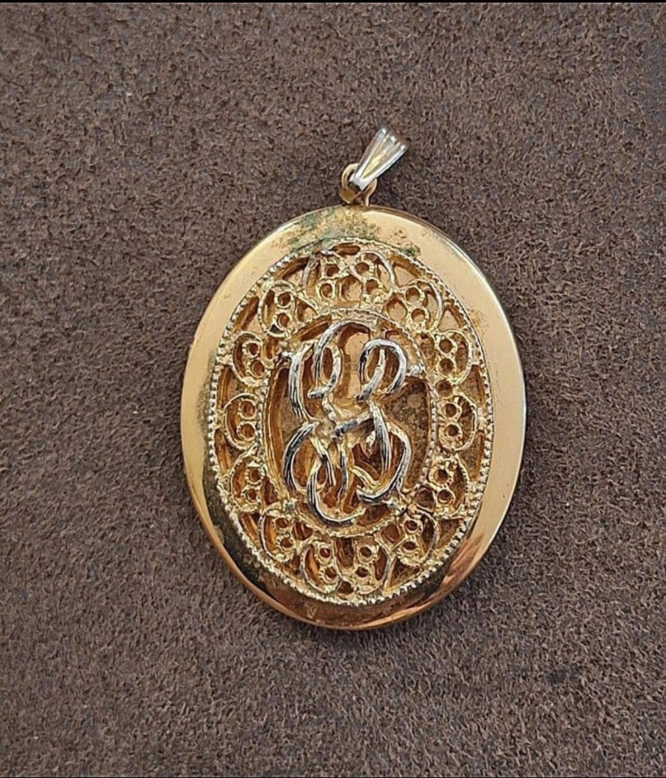 1980s Large Gold Tone Filigree Oval Locket Pendant