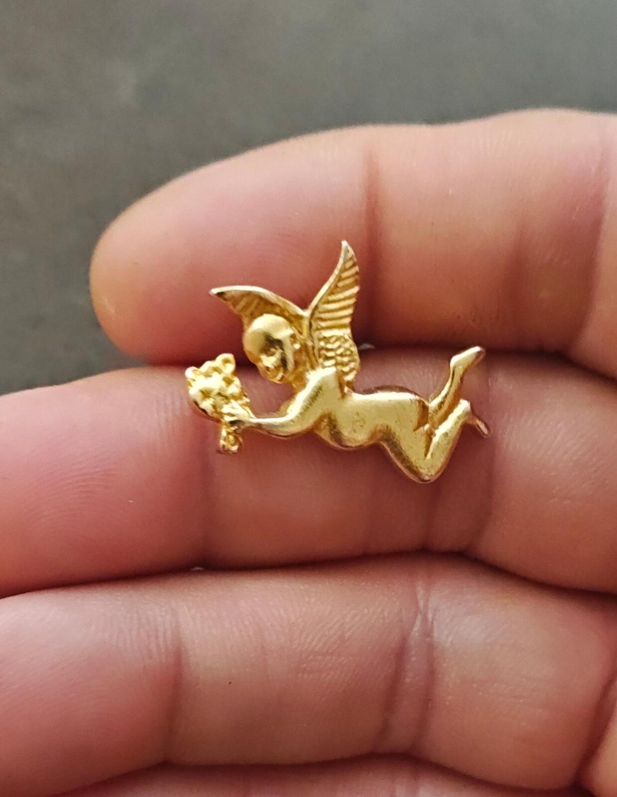 1990s Gold Tone Flying Angel Holding Flowers Brooch