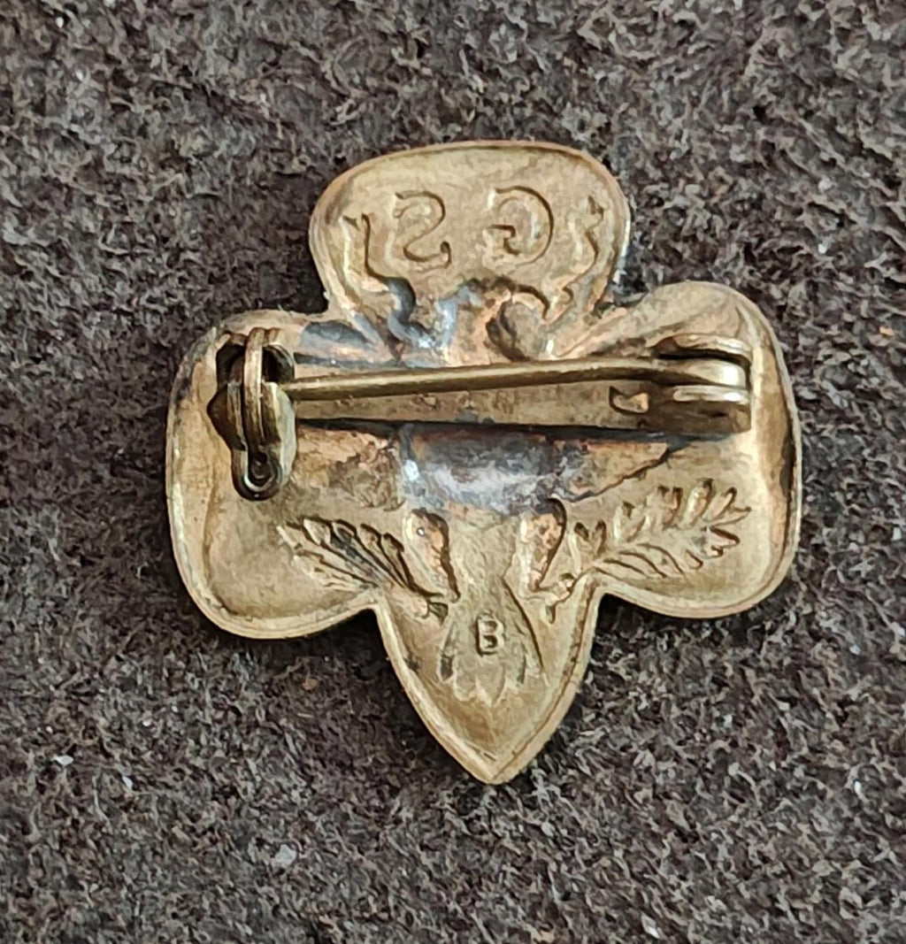 Gold-tone Girl Scout eagle brooch pin back view with catch and engraved markings