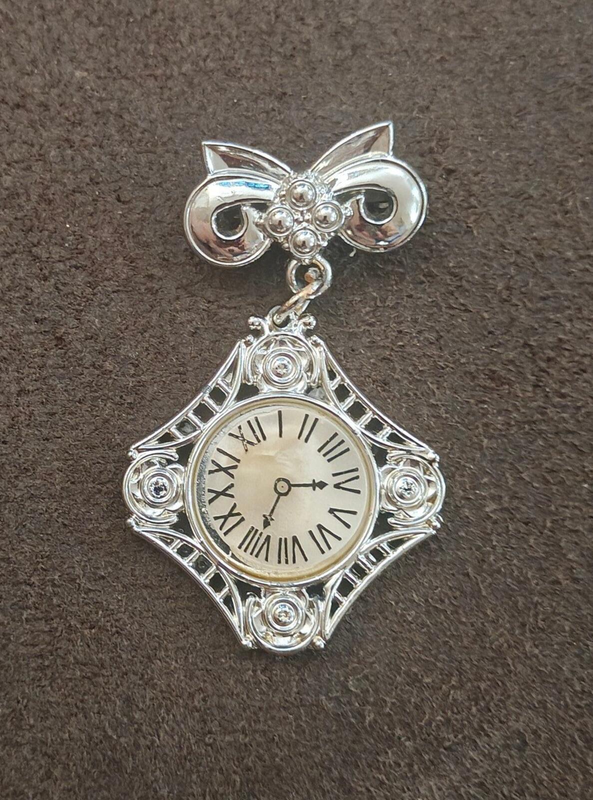 1980s Silver Tone Art Deco Style Bow Clock Motif Dangle Brooch