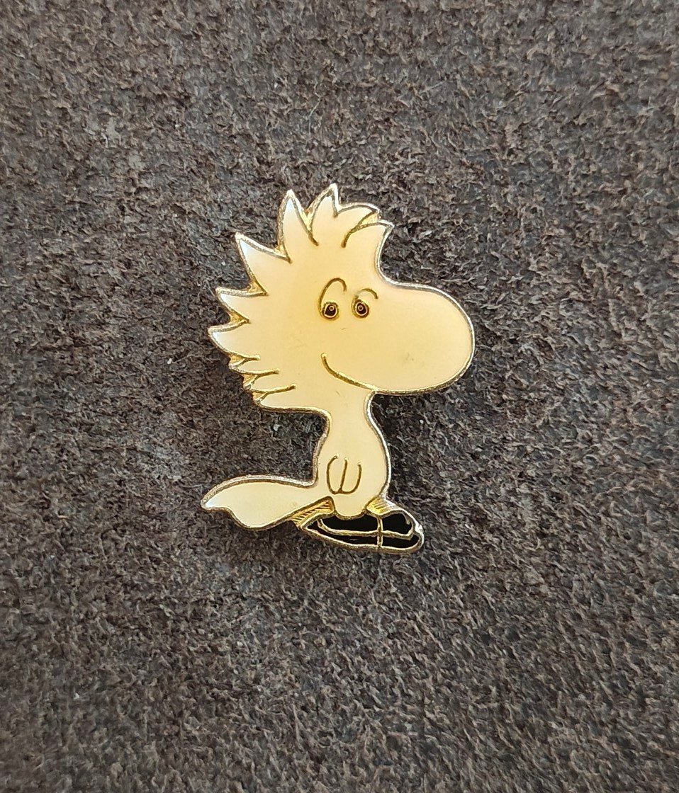 1970s Peanuts Woodstock Wearing Ice Skates Gold Tone Enamel Pin