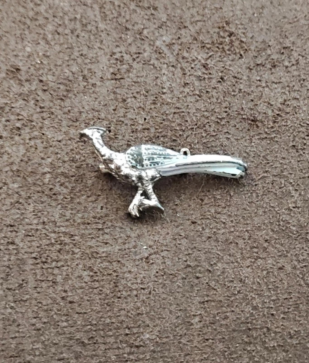 Road runner bird enamel brooch, silver tone with open wing and pin bail