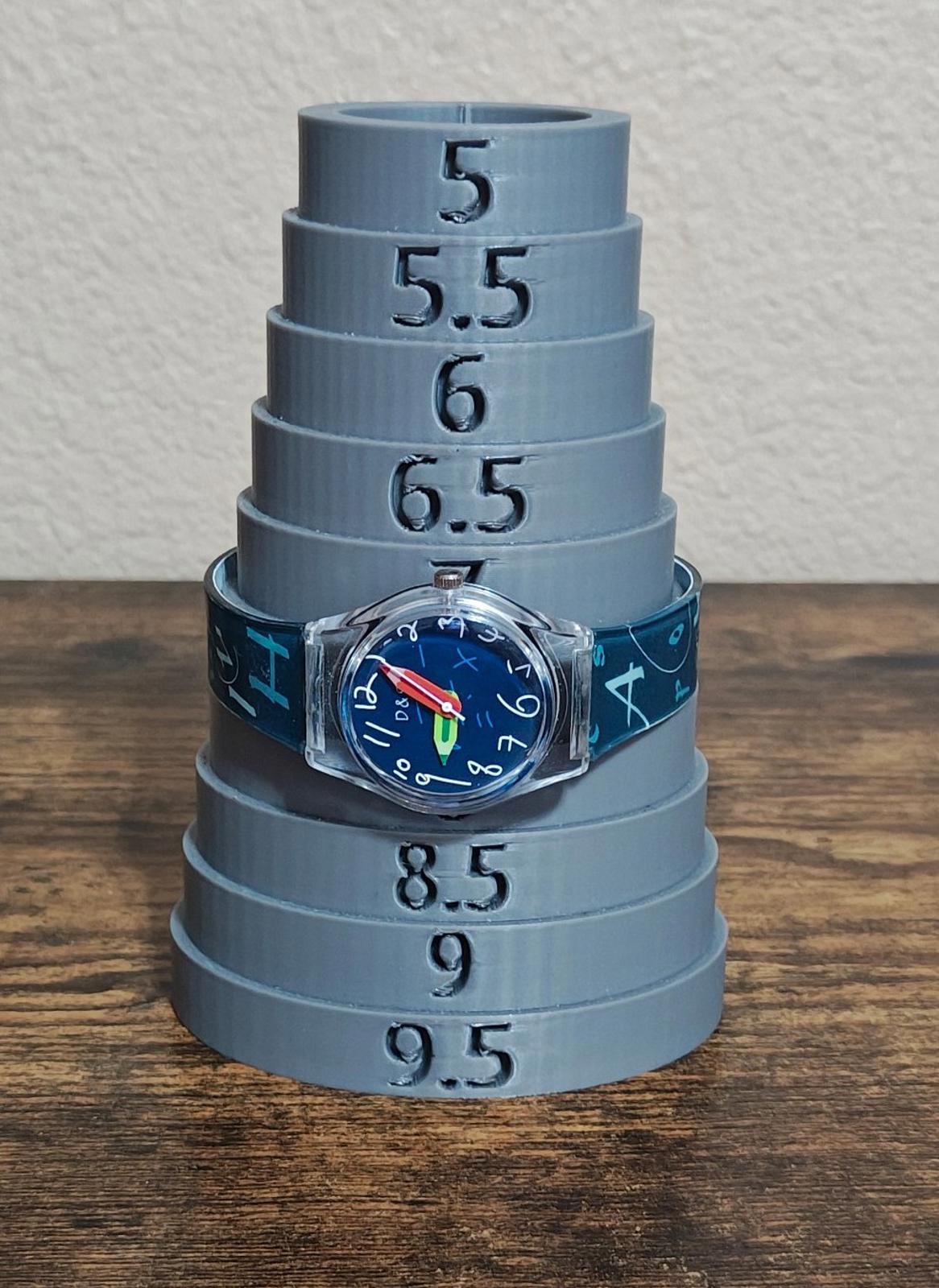 Unisex teacher watch on numbered bands, with round blue dial and blue printed strap