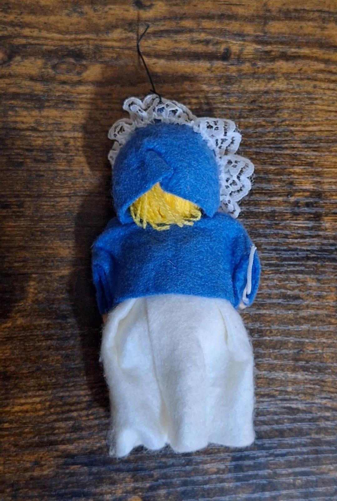 Handmade pilgrim girl ornament figurine hanging, blue hood and white skirt back