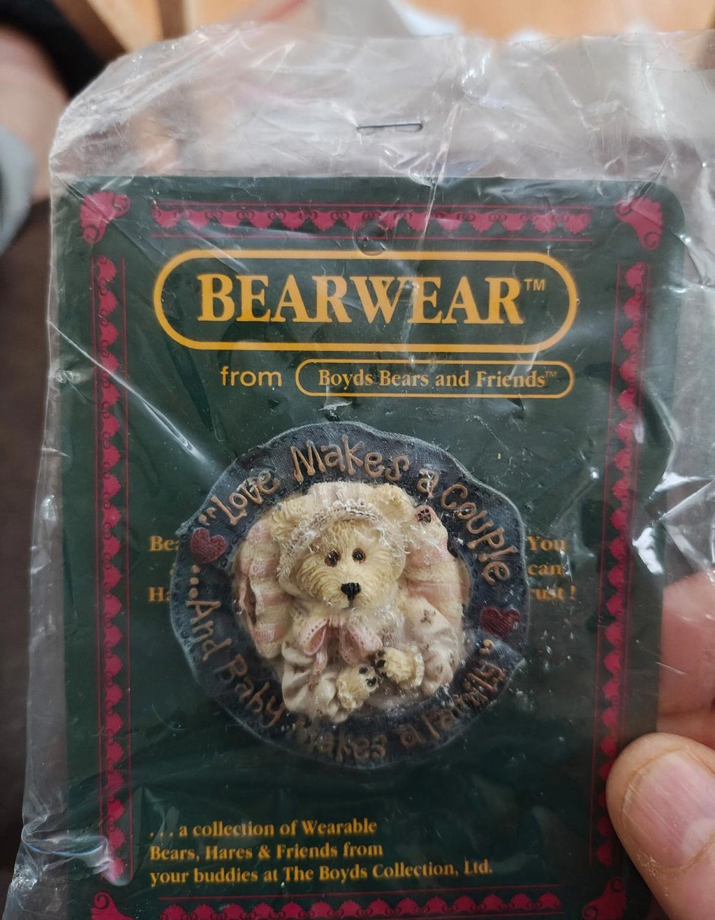 Beige teddy bear brooch in Bearwear packaging, round bear face detail