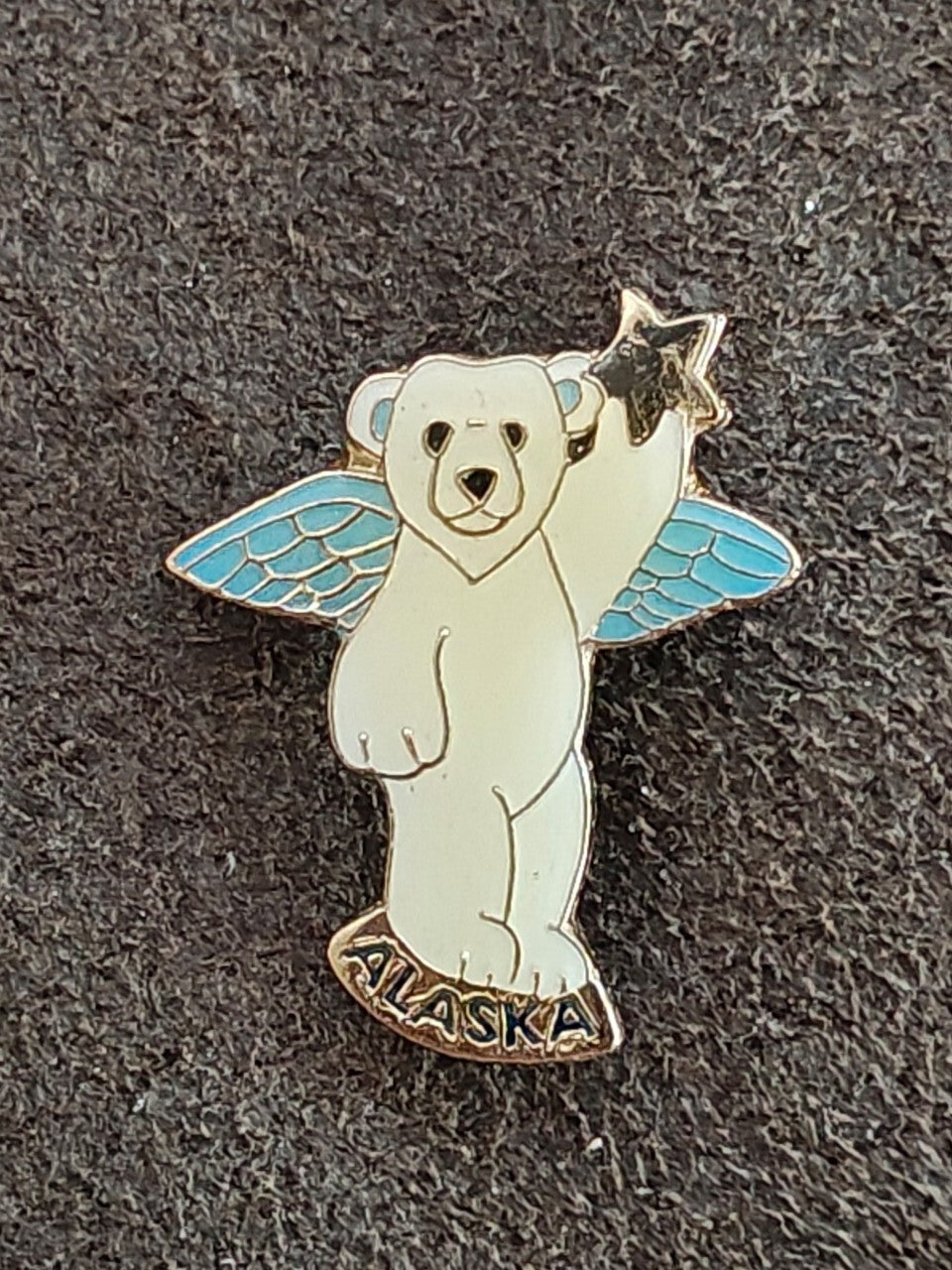 1980s Alaskan Polar Bear Guardian Angel Gold Tone Enamel Pin.