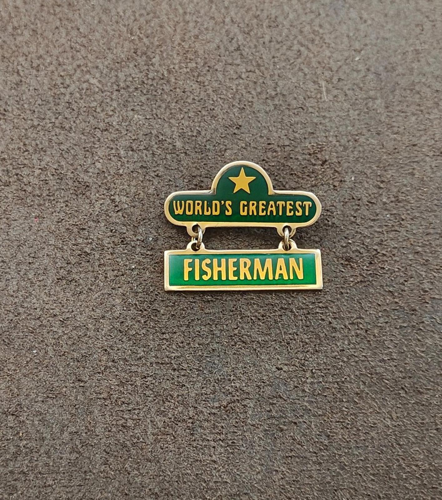 1970s "Worlds Greatest Fisherman Gold Tone Green Enamel Dangle Pin