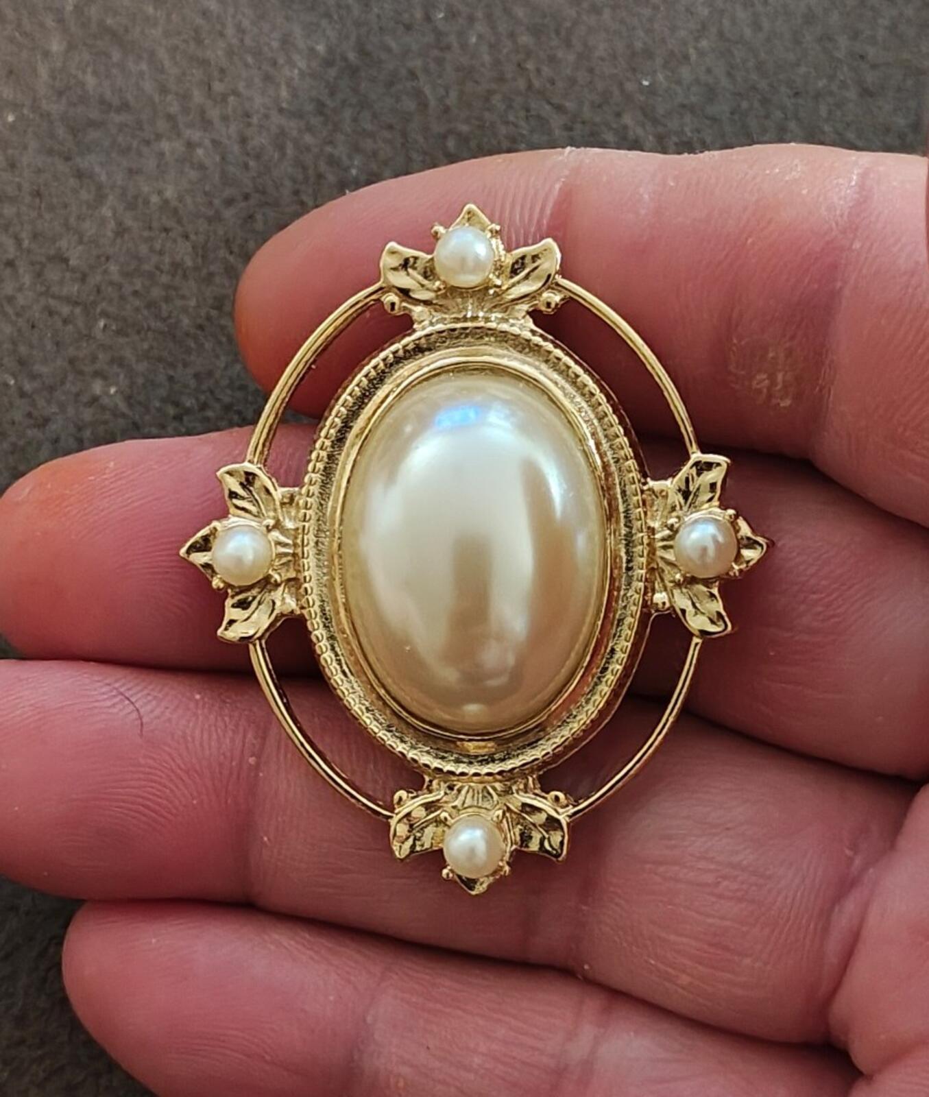 1970/80s Victorian Style Gold Tone Brooch With An Oval Faux Mabe Pearl Cabochon