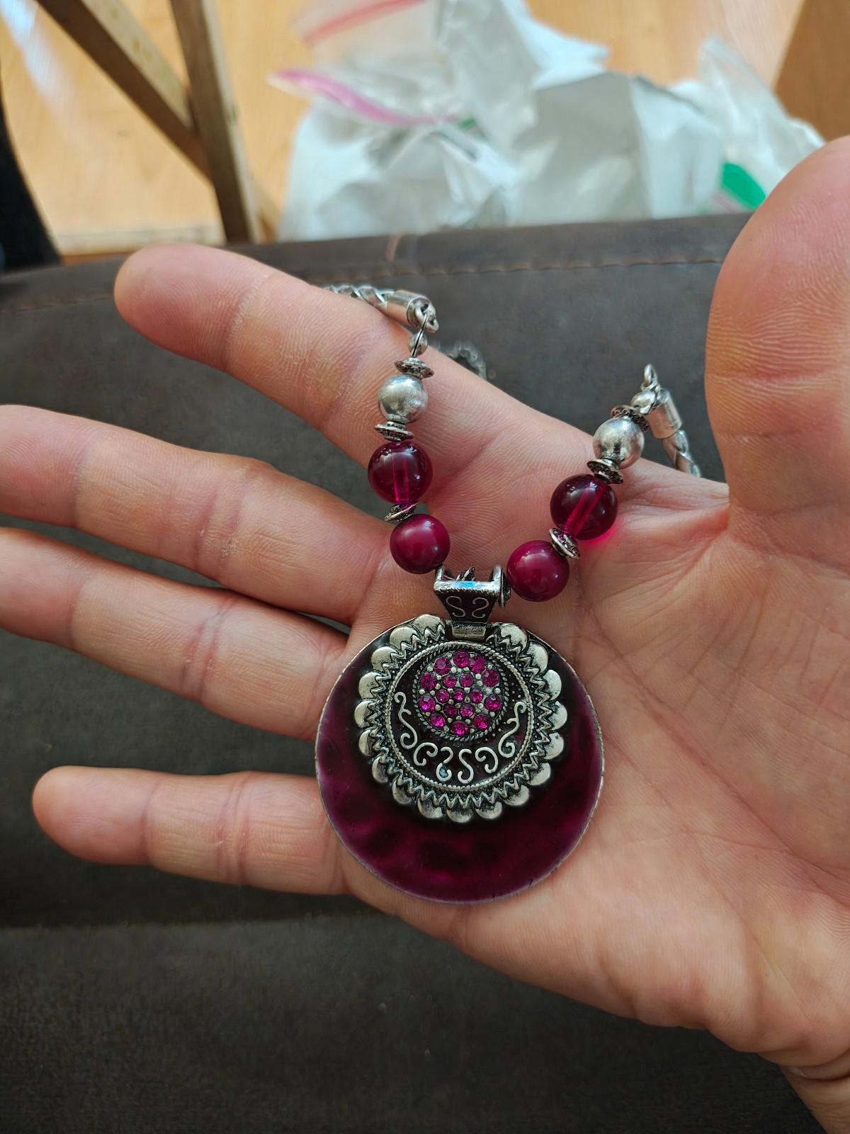 Silver Tone Braided Plastic Chain With Round Burgundy Pendant and Beaded Accents