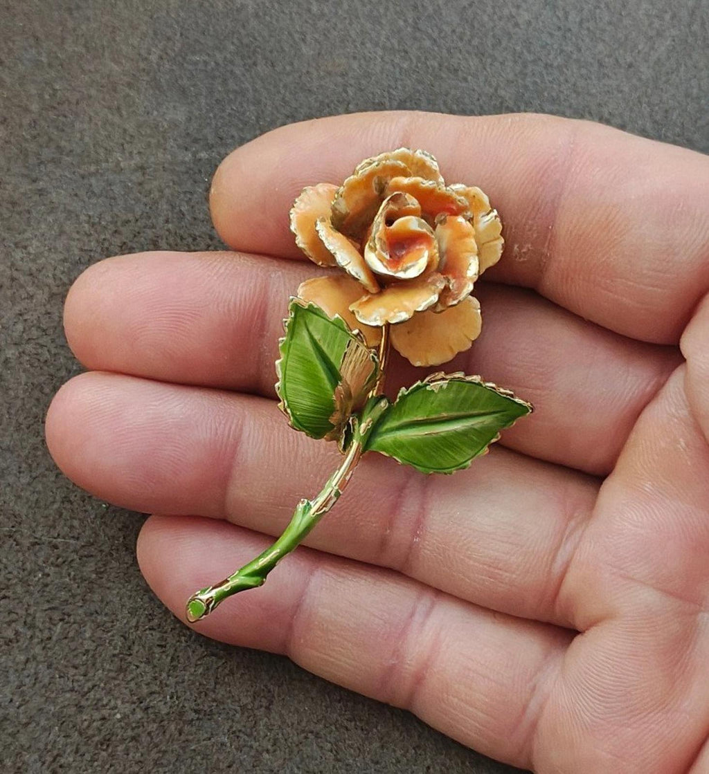 Gold-tone enamel rose and leaf pin, orange flower with green leaf enamel and stem