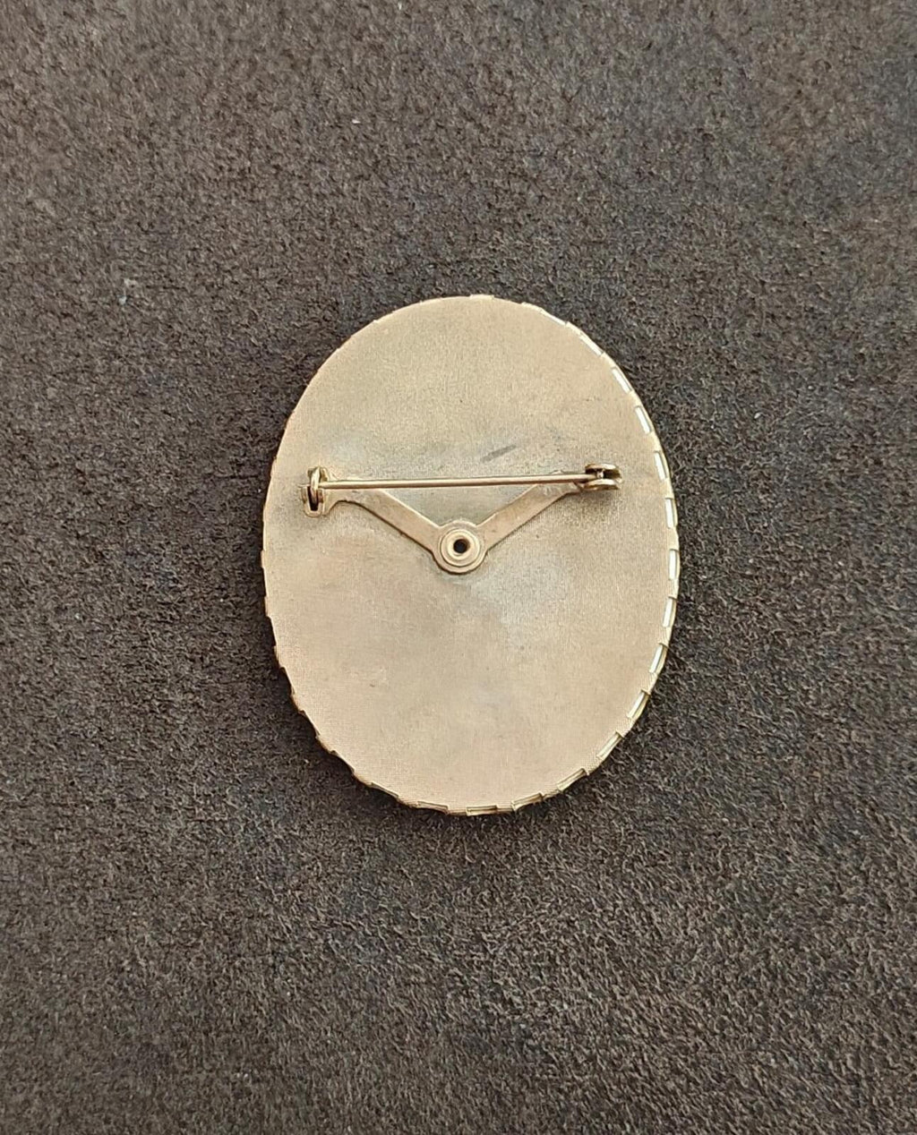 Gold-tone pinback brooch back with straight pin and safety clasp